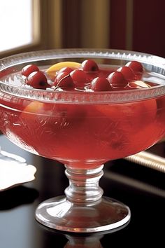 Chatham Artillery Punch Recipe: A fruity and colorful cocktail featuring brandy, rum, bourbon, and fresh juices, perfect for parties. This vibrant punch is a mix of flavors ideal for gatherings.