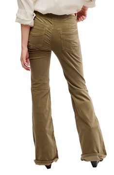 A stretchy pull-on waistband brings ultimate comfort to a pair of jeans cut from stretchy corduroy in a retro flare-leg silhouette. 34" inseam; 23" leg opening; 9 1/2" front rise; 13" back rise (size 29) Pull-on style Faux front scoop pockets; back patch pockets 98% cotton, 2% spandex Machine wash, tumble dry Imported Casual Corduroy Flare Jeans, Stretch Flare Corduroy Bottoms, Stretch Corduroy Flare Bottoms, Stretch Corduroy Straight Leg Pants, Stretch Corduroy Mid-rise Jeans, Stretch Mid-rise Corduroy Jeans, Stretch Corduroy Bottoms For Fall, Stretch Corduroy Full Length Bottoms, Stretch Corduroy Full Length Pants