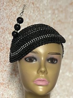 Simple, yet elegant. Black Beaded Fascinator half hat trimmed with rhinestones, and hat pin. The hat pin is for decorative purposes only. The hat is affixed to the head via a hatstring. The hat measures approximately 9.75 in X 6.75 inches at its widest parts. PLEASE NOTE All items for Free Shipping will be shipped via USPS First Class Mail. Gifts for mom, sister, wife, or yourself. Evening Flapper Adjustable Fascinator, Evening Flapper Style Adjustable Fascinator, Gatsby Style Mini Hat With Short Brim For Evening, Gatsby Style Evening Mini Hat Headband, Evening Gatsby Mini Hat With Short Brim, Gatsby Style Headband Hat For Evening, Elegant Mini Hats With Rhinestones For Weddings, Elegant Bead Cap Headband, Gatsby Style Evening Fascinator With Short Brim