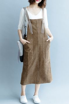 Fabric: Fabric has no stretchSeason: Fall .SpringType: Dress Sleeve Length: SleevelessColor: CoffeeDressesLength: Knee LengthStyle: CasualMaterial: CorduroySilhouette: A line One Size(Fit S/M/L): Length:114 cm .Bust:104 cm Casual Brown Dress With Pockets, Casual Brown Dresses With Pockets, Khaki Sleeveless Dress With Pockets, Brown Cotton Dress With Pockets, Brown Cotton Dresses With Pockets, Casual Corduroy Dress With Pockets, Casual Sleeveless Corduroy Dress, Sleeveless Corduroy Summer Dress, Women Autumn Outfits