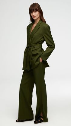 A versatile jacket, our boxy Belted Blazer can be worn belted and cinched at the waist or left open for a more casual look. While the fit is designed to be oversized, the blazer still strikes a sculpture silhouette with powerful shoulders and smart cuff sleeves. Additional details include a wool felt combo beneath the collar, a wide lapel, and interior pockets. Olive Green Suit For Women, Womens Green Suit, Blazer Aesthetic, Green Suit Women, Olive Blazer, Olive Green Suit, Oversized Blazers, Olive Style, Christmas Attire