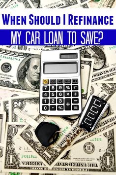 a calculator sitting on top of money with the words when should i refinance my car loan to save?