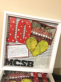 a display case with pictures and letters on the front is decorated in red, white and yellow