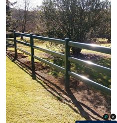 an image of a fence that is in the grass