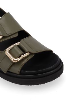 Polished buckles add a shimmering finish to the hook-and-loop straps of this sporty slingback sandal cradled by a cushy anatomical platform. 1 3/4" heel; 1 1/4" platform (size 39) Arch support Leather upper and lining/rubber sole Made in Spain Modern Slingback Footbed Sandals With Buckle, Modern Slingback Footbed Sandals With Buckle Closure, Modern Slingback Sandals With Buckle Closure, Modern Sport Sandals With Adjustable Strap, Modern Synthetic Sport Sandals With Adjustable Strap, Modern Green Sandals With Removable Insole, Green Leather Sport Sandals With Cushioned Footbed, Modern Slingback Footbed Sandals With Adjustable Strap, Modern Footbed Slingback Sandals With Adjustable Strap