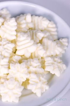 a white plate topped with pieces of food