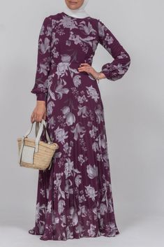 Elevate your everyday style with our Everyday casual modest high neck pleated maxi dress in ditsy floral print. The purple hue adds a touch of luxury to this versatile piece, perfect for any casual occasion. Stay comfortable and chic with its flowy silhouette and intricate pleat detailing. Indulge in the world of modest fashion with our Everyday casual DESIGN high neck pleated maxi dress in ditsy floral print in purple. The delicate pleats and flowy silhouette exude elegance, while the purple hu Modest Pleated Maxi Dress, Flowy Purple Maxi Dress, Chic Purple Maxi Dress, Spring Mauve Maxi Dress With Floral Print, Chic Purple Floral Print Maxi Dress, Flowy Purple Maxi Dress For Fall, Feminine Purple Long Sleeve Maxi Dress, Purple Floral Print Maxi Dress, Spring Mauve Maxi Dress