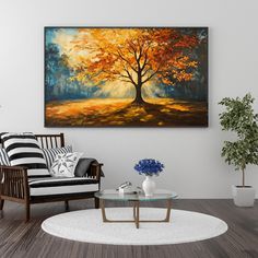 a living room with a painting on the wall