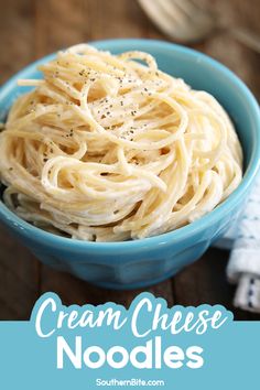 a blue bowl filled with cream cheese noodles