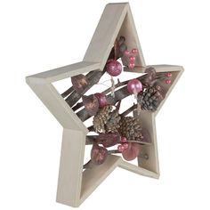 a wooden star decoration with pine cones and ornaments