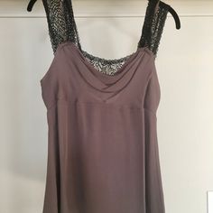 New Without Tags. Bcbgmaxazria Taupe Silk And Black Lace Overlay Camisole Sexy Top That Is Perfect For A Night Out Or To Layer Under A Jacket For That Polished Yet Playful Look. Cowl Neck With Peekaboo Black Lace And Black Lace Overlay On Shoulder Straps. Women's Size M Fabric Content: 100% Silk Overlay; 100% Silk Lining Stretch Camisole With Built-in Bra For Date Night, Cami Top With Built-in Bra For Evening, Chic Sleeveless Lace Top With Built-in Bra, Chic Lace Cami Top With Built-in Bra, Chic Cami Lace Top With Built-in Bra, Evening Cami Tank Top With Lace Trim, Evening Stretch Camisole Tank Top, Stretch Camisole Tank Top For Evening, Night Out Lace Cami Top With Built-in Bra