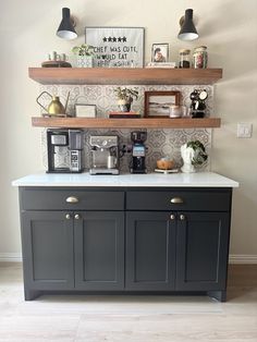 a coffee bar with shelves above it