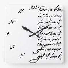 a clock that has writing on it