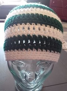 "This beanie is so cute and warm  It's made of really soft yarn and measures 8.5\" from top to bottom and 18\" around, it can be stretched further." Crochet Ponytail Beanie, Jets Nfl, Stripe Crochet, Ponytail Beanie, Ny Jets, Ponytail Hat, Nfl Fans, Crochet Cowl, Small Crosses