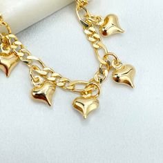 18k Gold Filled Bracelet, 3mm Figaro Chain Link with Cute Puffed Dangle Hearts Shape Charms Bracelet, Wholesale Price Jewelry Bracelet Size: - Length: 8 Inches | Thickness: 3mm     💎 With new products daily, quality and competitive prices, in DiJu Jewelry you find the most unique styles of modern designs, always looking for elegance and market trends. *Helping your Jewelry Businesses Grow *Starting your Own Business *Making your Own Collection: DiJu Jewelry ever brings Better Moments for your Life. 📲 Find many more styles in our DiJu Jewelry Etsy Store. https://www.etsy.com/shop/DJDiJuJewelry 💎 You can choose from unique styles of earrings, necklaces, pendants and charms, bracelets, anklets, rings, chokers, and many others. On the off chance that you can't locate a particular style here Gold Dangle Charm Bracelet With Heart Charm, Gold Dangle Heart Charm Bracelet, Gold Charm Bracelet With Heart Beads For Valentine's Day, Charms Bracelet, Figaro Chains, Figaro Chain, Solid Gold Jewelry, Starting Your Own Business, Jewelry Business