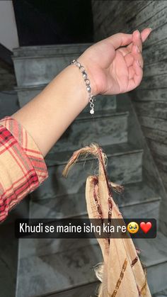 a person is holding onto a string attached to a doorknob with the words khud se maine ish kia re on it