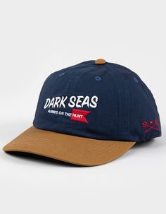 Dark Seas Huntsman Unstructured Snapback Hat. Embroidery On Front. Slightly Curved Bill. Adjustable Snapback Closure. Woven Label At Closure. 100% Cotton. Imported. Overalls Boys, Chino Pants Women, Wwe T Shirts, Hat Patches, Boys Graphic Tee, Hat Embroidery, Boys Backpacks, Girls Graphic Tee, Chino Jeans