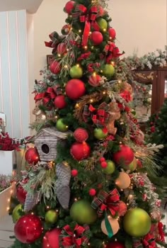 a christmas tree decorated with red and green ornaments