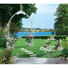 an outdoor garden area with flowers and plants