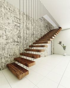 there is a stair case in the middle of this room with white tiles on the walls