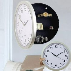 two clocks are hanging on the wall next to each other