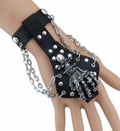 Description: Material : PU Leather,Alloy Color : Black Gothic Rock and punk style, very suitable for cool young men . A very good gift for yourself or someone special, which is a good choice for your fashion jewelry collection. Specification: Bracelet Length: approx 22cm, Width :approx 2cm Finger Ring Diameter: approx 2.5cm Back of hand length:approx 16cm Package Includes: 1 Piece Slave Bracelet Note: Since the size above is measured by hand, the size of the actual item you received could be sli Skeleton Hand Bracelet, Skeleton Bracelet, Vintage Ghost, Finger Bracelets, Back Of Hand, Ring Bracelet Chain, Leather Wristbands, Hand Bracelet, Skeleton Hand