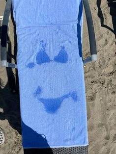 a towel that has been drawn on the beach