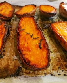 some sliced up sweet potatoes on a cutting board