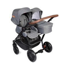 the baby stroller has two seats and is grey with orange trims on it