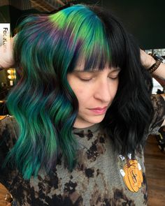 #northernlightsvibes #dimensionalhaircolor #mutedrainbowhairinspo #vividhaircolor #greenandbluehair #splitdye #splitdyehairinspo #pulpriothair #hairinspo #haircolorinspo #hairstyleinspo Split Dye Vivid, Northern Lights Hair, Multi Green Hair, Purple Green And Blue Hair, Multi Coloured Hair, Olive Green Hair, Green And Blue Hair Dye, Green And Purple Hair Split, Purple And Green Hair