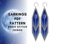 the earrings are made with blue seed beads and silver findings, while the moon is in the background