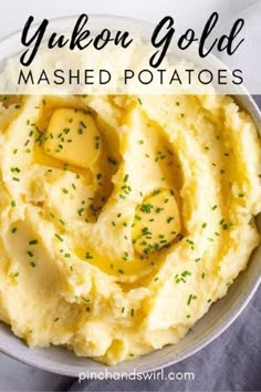 a bowl filled with mashed potatoes and topped with butter