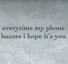 an airplane flying in the sky with a quote on it that says, every time my phone buzzes i hope it's you