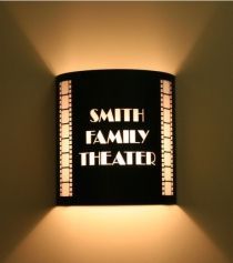 a black and white sign that says, smith family theatre on the side of a wall