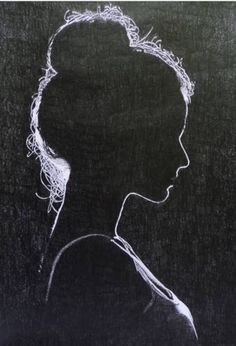 a black and white drawing of a woman's profile on a chalkboard background