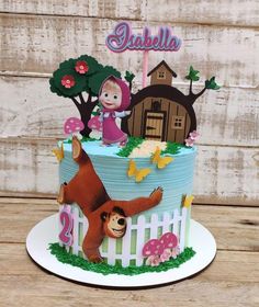 a birthday cake with an image of masha and the bear on it