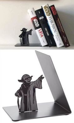 a shelf with some books on it and an image of yoda in the middle