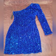 Nwt Blue Sequin One Shoulder Dress. Size L/Xl Royal Blue One-shoulder Dress For Night Out, Blue Long Sleeve Mini Dress For Party Season, Blue Long Sleeve Sequin Mini Dress, Blue Winter Cocktail Dress, Blue Mini Dresses For Winter, Royal Blue Long Sleeve Mini Dress For Party, Sequin One Shoulder Dress, Red Dress Sleeves, Shirred Waist Dress