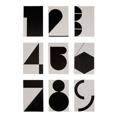 nine black and white squares with numbers in the middle one has an abstract design on it