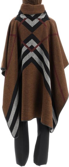 Stay warm and stylish with this luxurious cashmere poncho featuring a jacquard chevron check motif and lambskin trims. Perfect for adding a touch of elegance to any outfit. Luxurious cashmere material Jacquard chevron check motif Lambskin trims for added detail One size fits all | Burberry Women's Chevron Check Poncho in Brown | Size XS/Small | 8058151 Burberry Poncho, Burberry Cape, Mantel Cape, Poncho Scarf, Cashmere Cape, Cashmere Poncho, Cape Jacket, Burberry Jacket, Cape Coat