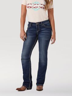 RIDING JEANS THAT NEVER QUIT Feel confident and comfortable in your riding clothes by giving yourself the best seat possible. Wrangler® women's Ultimate Riding Jeans are designed for fit, form, and function while on horseback, but they are bound to become your go-to jeans for working in the barn and running errands around town. Q-Baby women's jeans feature a mid-rise fit and no-gap waistband for full coverage when you're in the saddle as well as added stretch and flat seams for all-day comfort. Riding Jeans, Riding Clothes, Never Quit, On Horseback, Riding Outfit, Wrangler Jeans, The Barn, Dark Wash Denim, Feel Confident