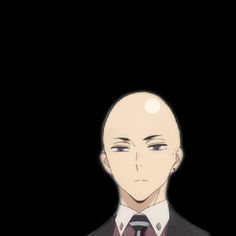 a bald man in a suit and tie looking at the camera with an evil look on his face