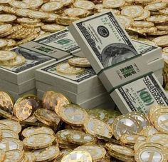 stacks of gold and silver coins with one hundred dollars stacked on top of each other