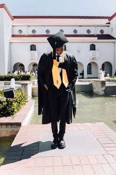 Black graduate in a black Black Black Cap And Gown Graduation Outfit Men, Graduation Poses Photo Shoots For Men, Graduation Shoot Ideas Men, Men’s Graduation Poses, Graduation Boy Pictures, Black Cap And Gown Graduation Outfit, Graduation Poses For Men, Graduation Pictures For Men