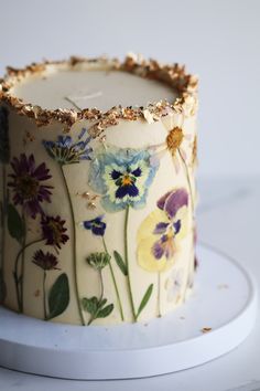 there is a cake decorated with flowers on it