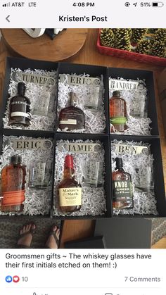 six bottles of gin in a box on top of a table with the caption that reads