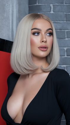 This sleek bob with platinum blonde hair offers a polished, modern finish for women shoulder styles. Its precise cut and smooth texture suit round faces, creating a timeless look. Popular Haircuts For Women, Medium Length Haircut Ideas, Women's Haircuts, Medium Length Haircut, Sleek Bob, Popular Haircuts, Platinum Blonde Hair, Round Faces, Platinum Blonde