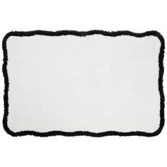 a white rug with black border