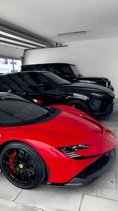 a red sports car parked in a garage