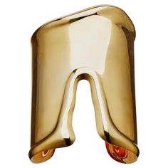 This Elsa Peretti for Tiffany & Co. large bone cuff bracelet, the large design of longer form, is composed of 18K gold. Anatomical in style, with raised edges, the cuff reflects the natural contours of the underlying wrist bone. A contemporary example of this revolutionary, streamlined form, the large bone cuff remains a fresh and arresting statement jewel to beautify the slender wrist. Product Details: Item #: BA-21363 Artist: Elsa Peretti for Tiffany & Co. Country: Italy Circa: 21st Century Size: Large Cuff model, Small Size Materials: 18K Gold Signed: c Elsa Peretti, TIFFANY & CO., Au 750 ITALY Macklowe Gallery Curator's Notes: After working in New York as model and muse for Halston, Elsa Peretti joined Tiffany & Co. in the 1970s, enticed by an offer of total design freedom from the com Tiffany Bone Cuff, Elsa Peretti Tiffany, Bone Cuff, Tiffany Gold, Modern Bangle, 18k Gold Bangle, Tiffany And Co Bracelet, Country Italy, Open Heart Ring